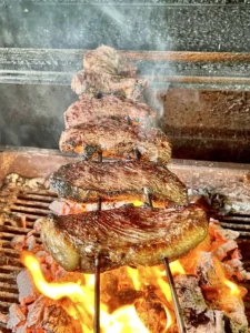 grilling picanha over hot coals