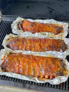 smoked ribs in aluminum foil
