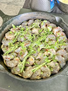 seasoned shrimp in a cast iron