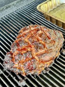 smoked leg of lamb on a smoker