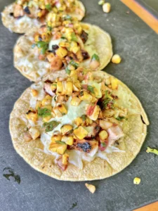chicken tacos on a cutting board