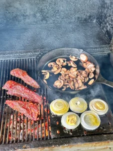 hanger steak sandwich ingredients on the grill