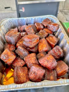 Pork belly burnt ends in a pan