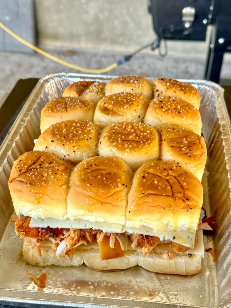 smoked chicken sliders on the pan