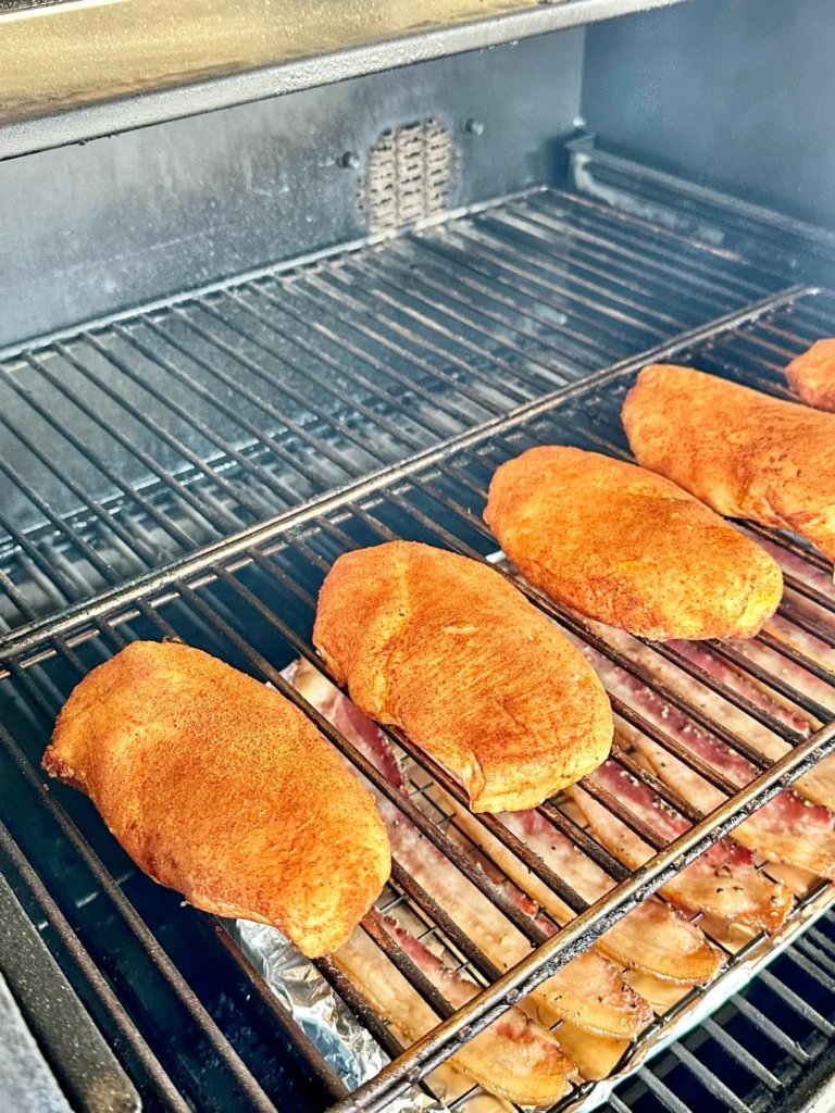 smoked chicken breasts on the smoker