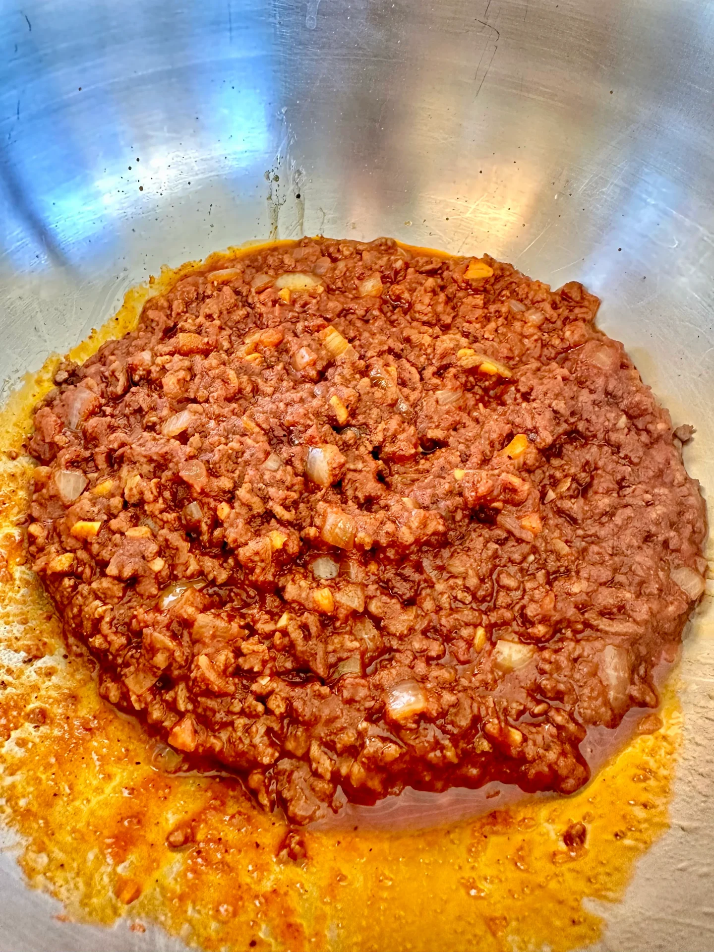 chili and cheese in a bowl