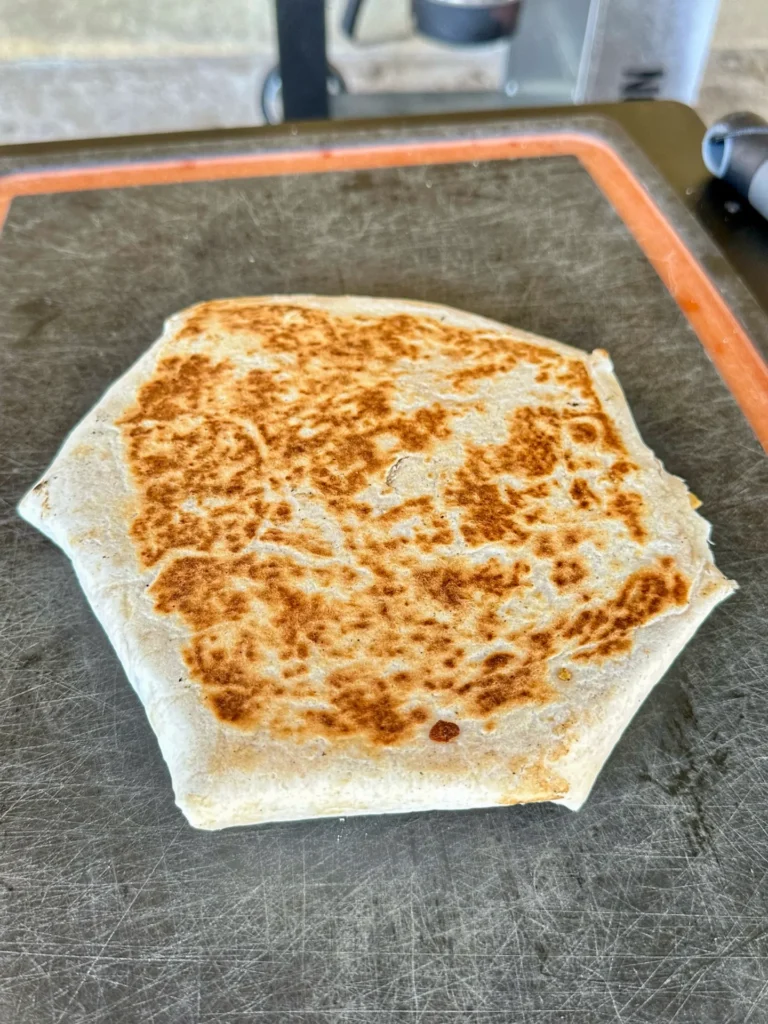 crunch wrap on cutting board