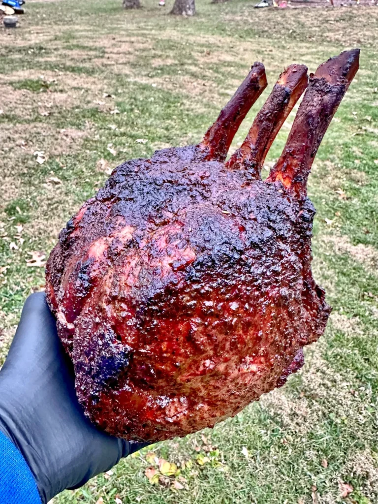 prime rib in a hand