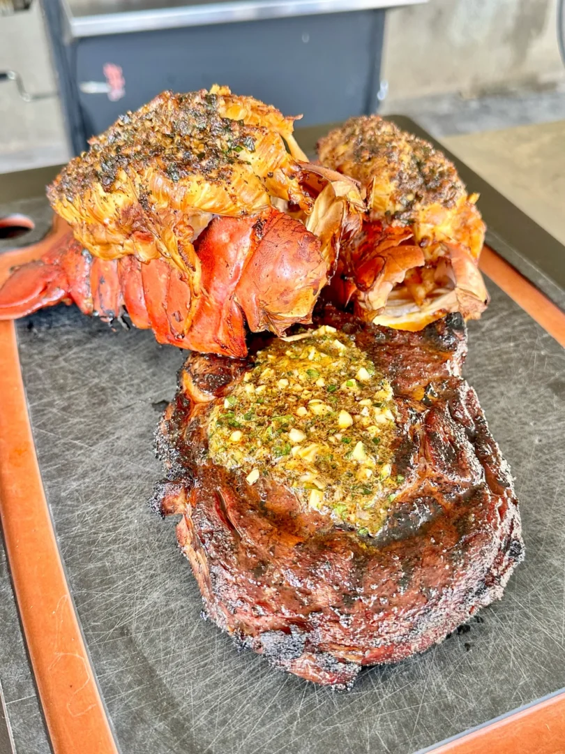 smoked ribeye and cajun honey lobster