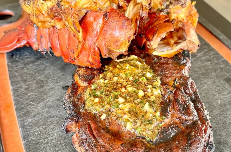 smoked ribeye and cajun honey lobster