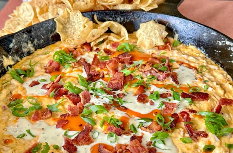 buffalo chicken dip in a cast iron