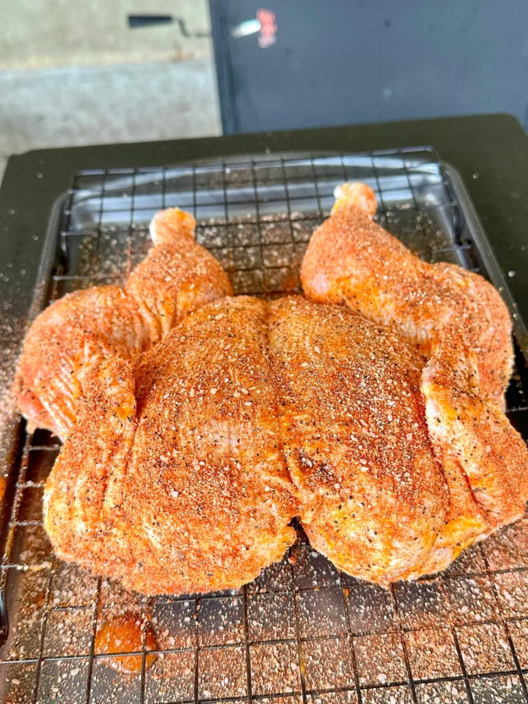 seasoned chicken on a wire rack