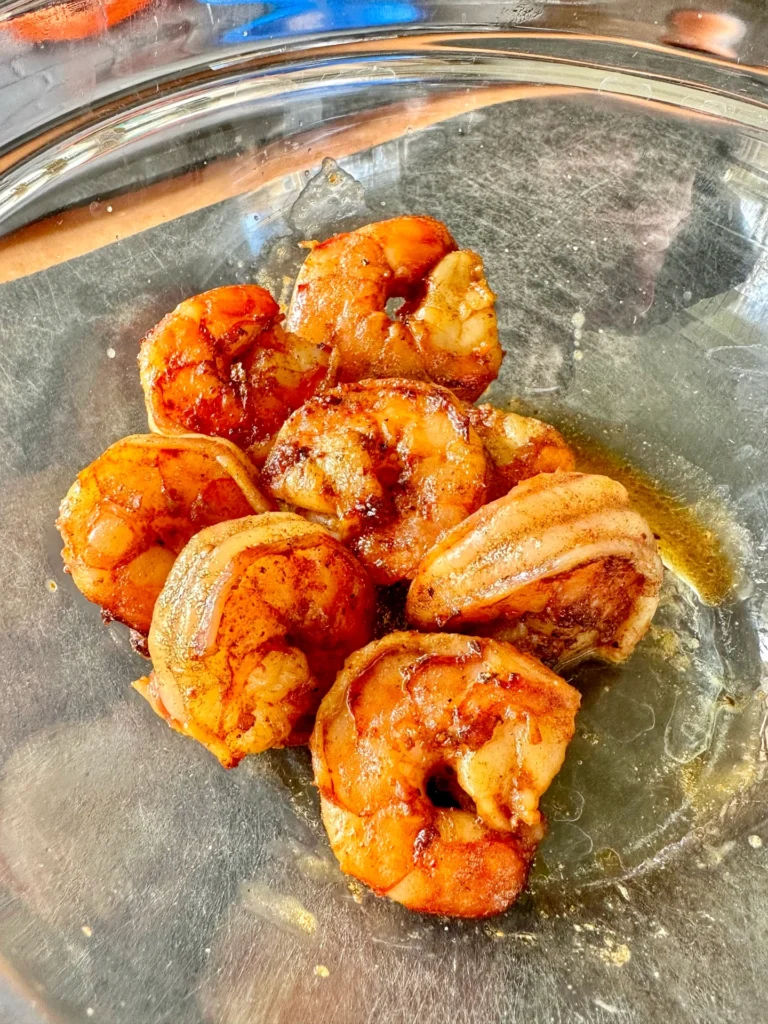 grilled shrimp on a cutting board