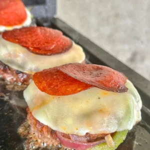 pizza burger being assembled