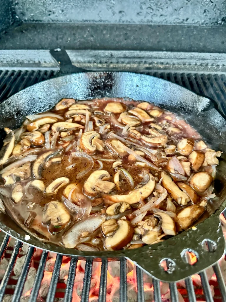 onion and mushroom sauce in a pan