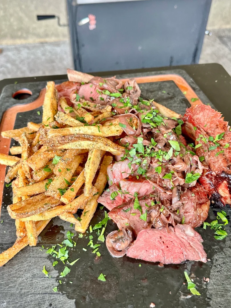 grilled ribeye steak and fries
