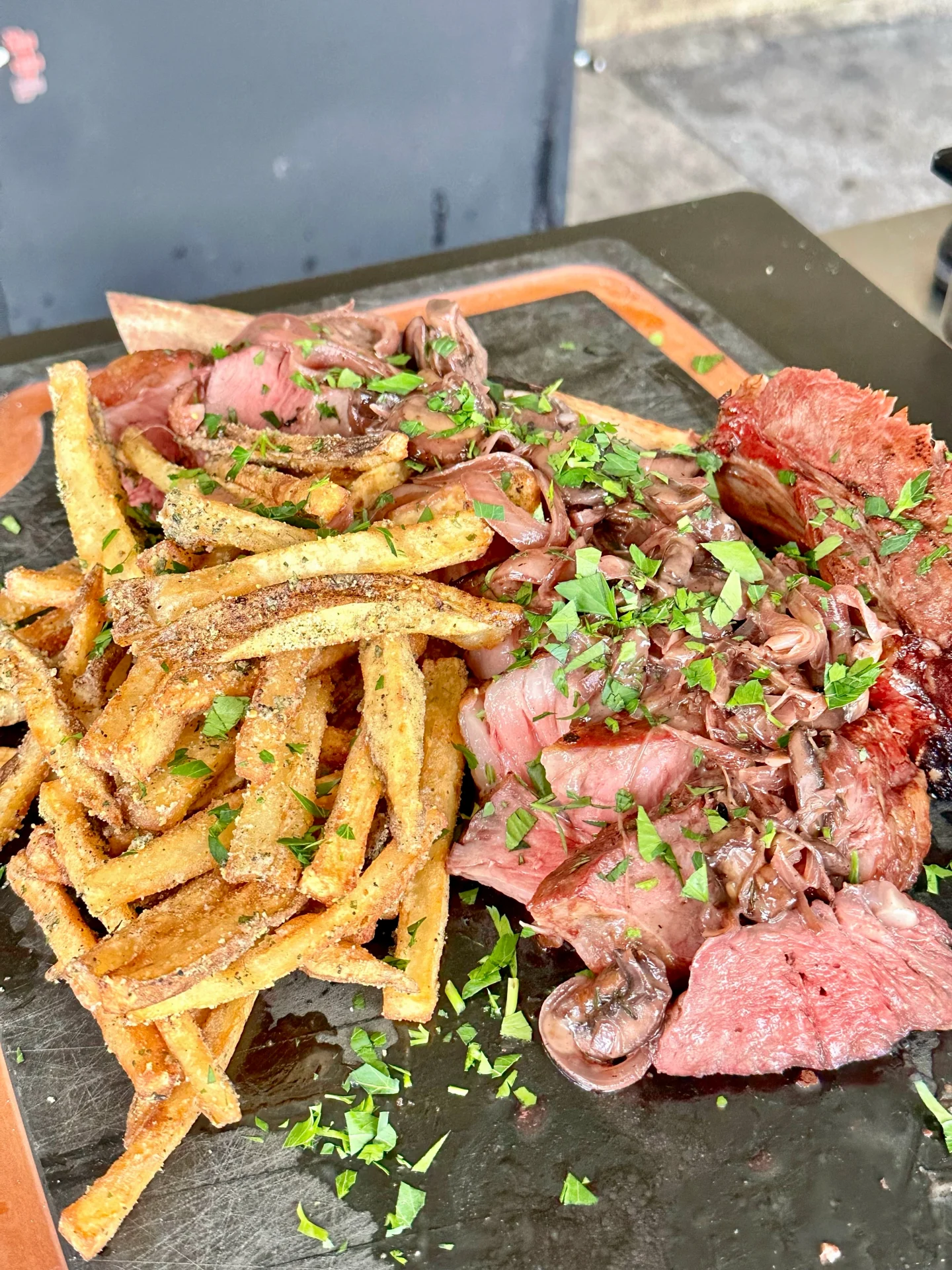 sliced up steak and fries