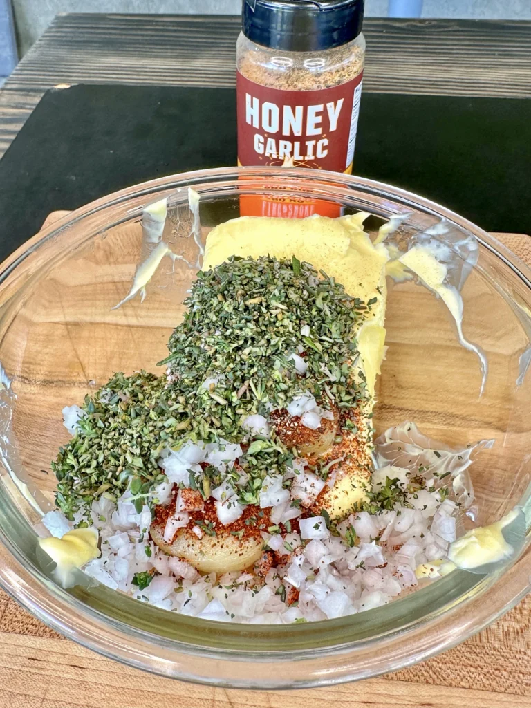 making the garlic butter in a bowl