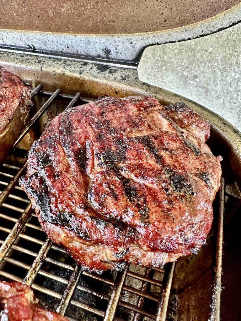 smoking steaks on a kettle grill