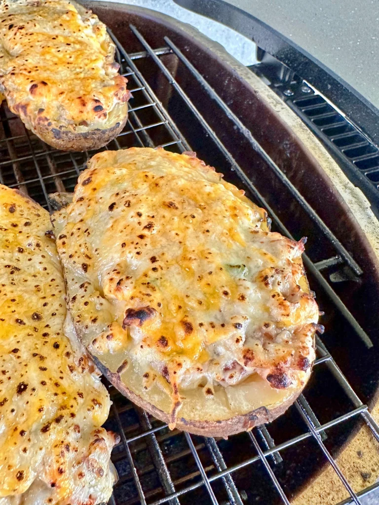 cheese on top of the stuffed potato skins