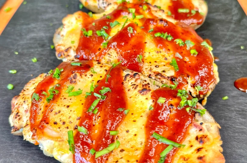 Jalapeno Popper Chicken Stuffed Potato Skins on a cutting board