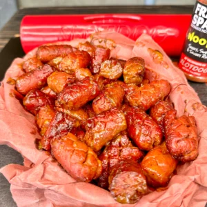 smoked hot dogs in a basket