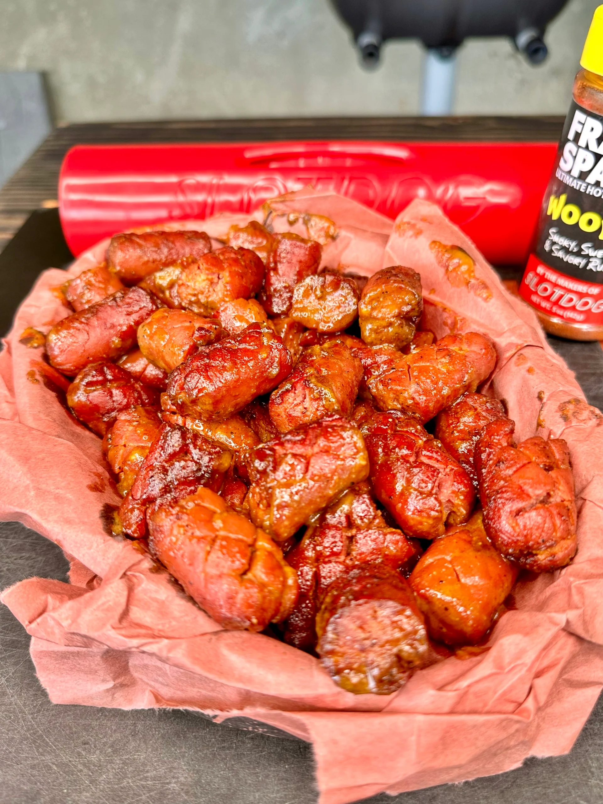 smoked hot dogs in a basket