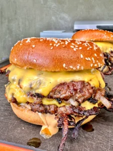 smash burgers on a cutting board