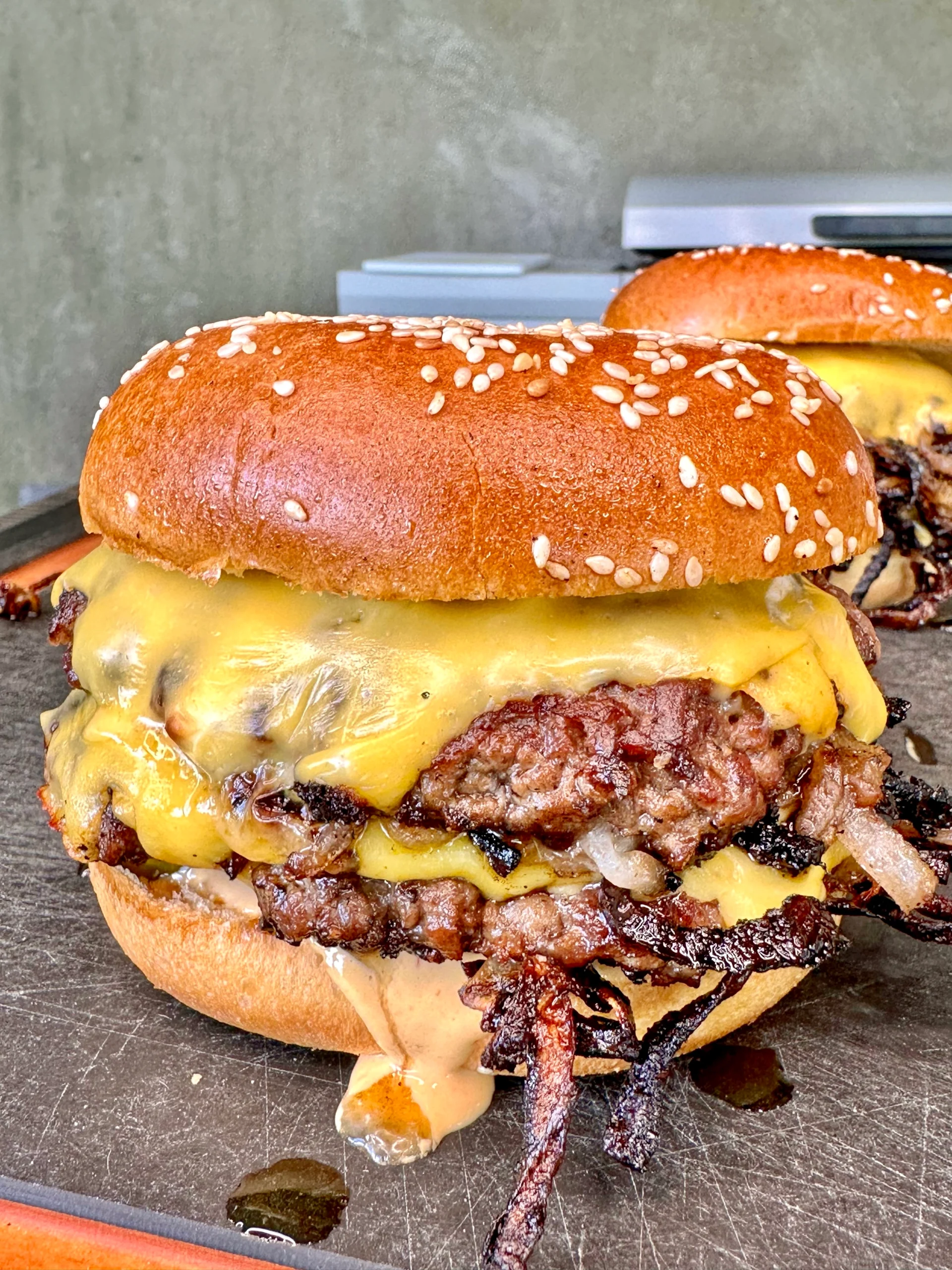smash burgers on a cutting board