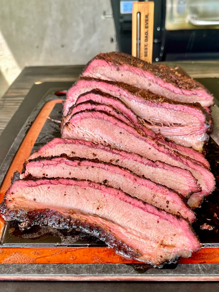 sliced brisket on a cutting board