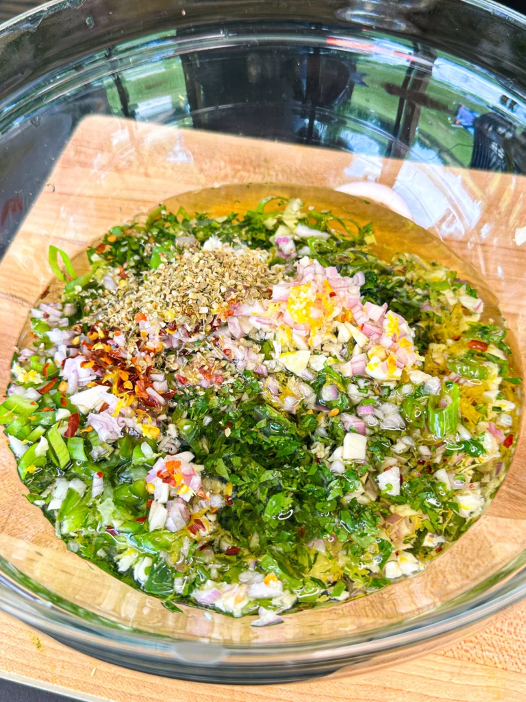 ingredients for thee chimichurri in a bowl