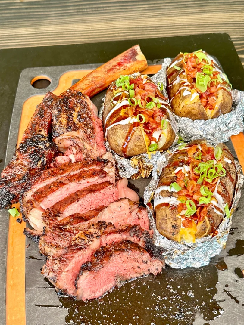 steak and loaded baked potatoes