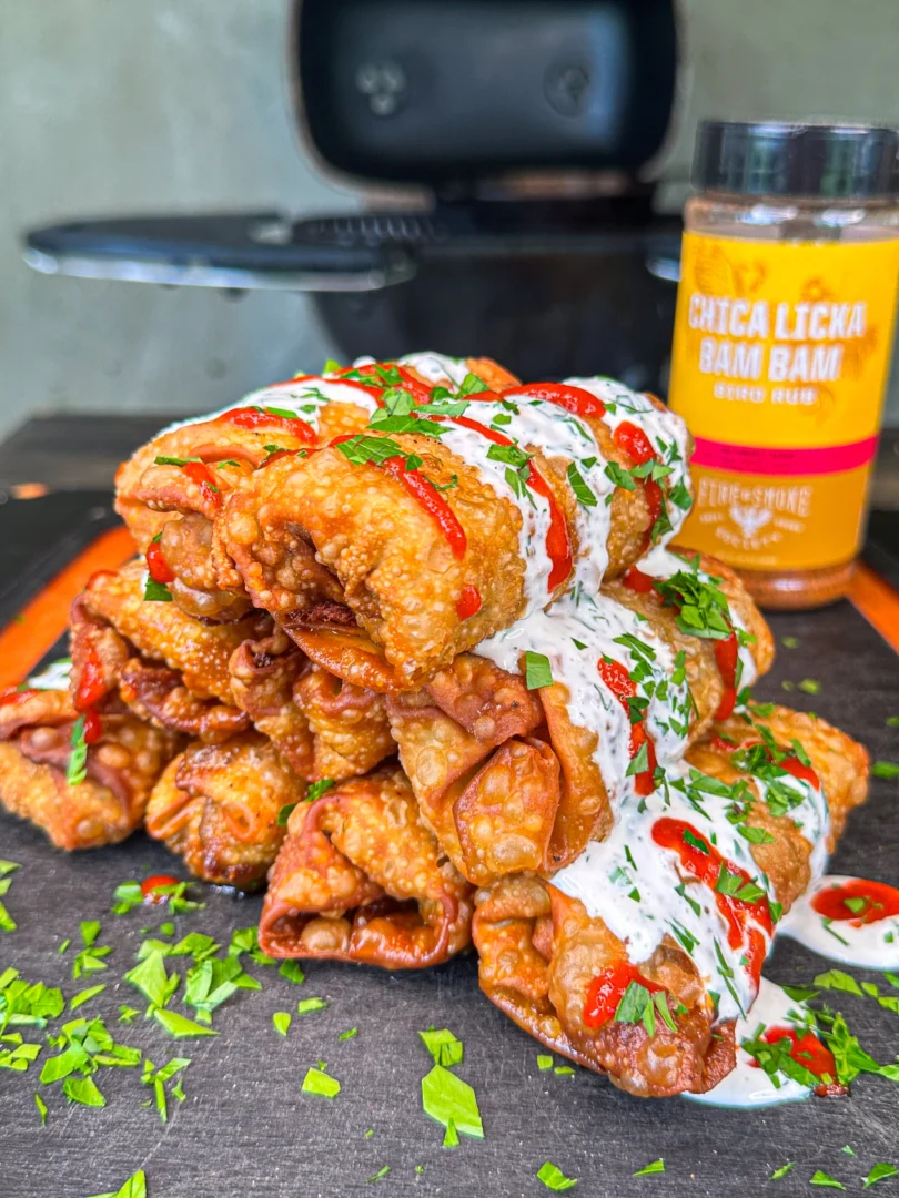 cajun egg rolls on a cutting board