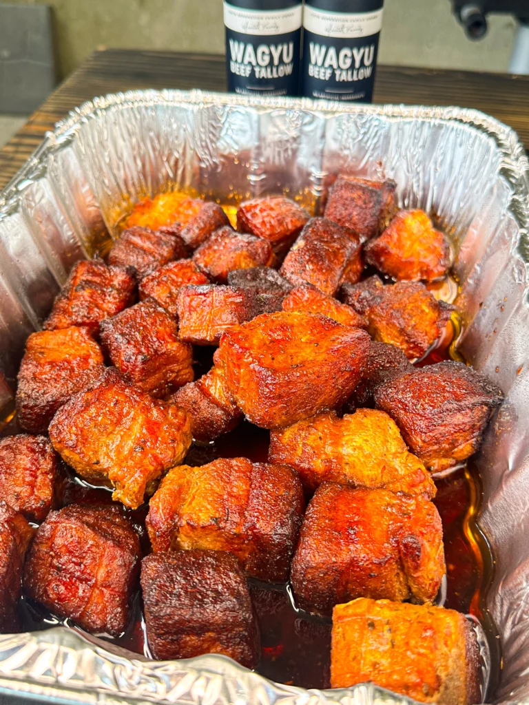 pork belly in a pan with seasoning