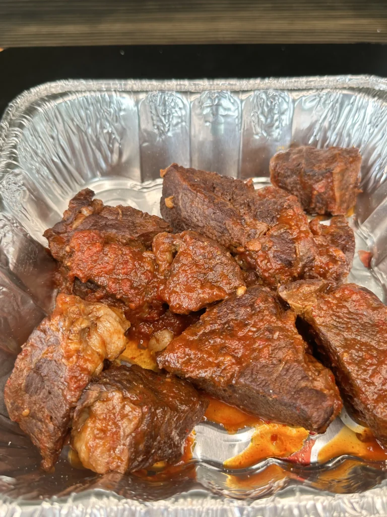 birria beef in a pan