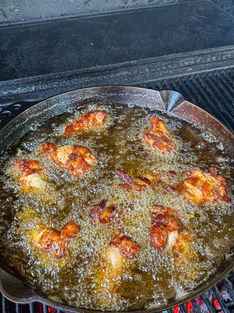 frying chicken wings in oil