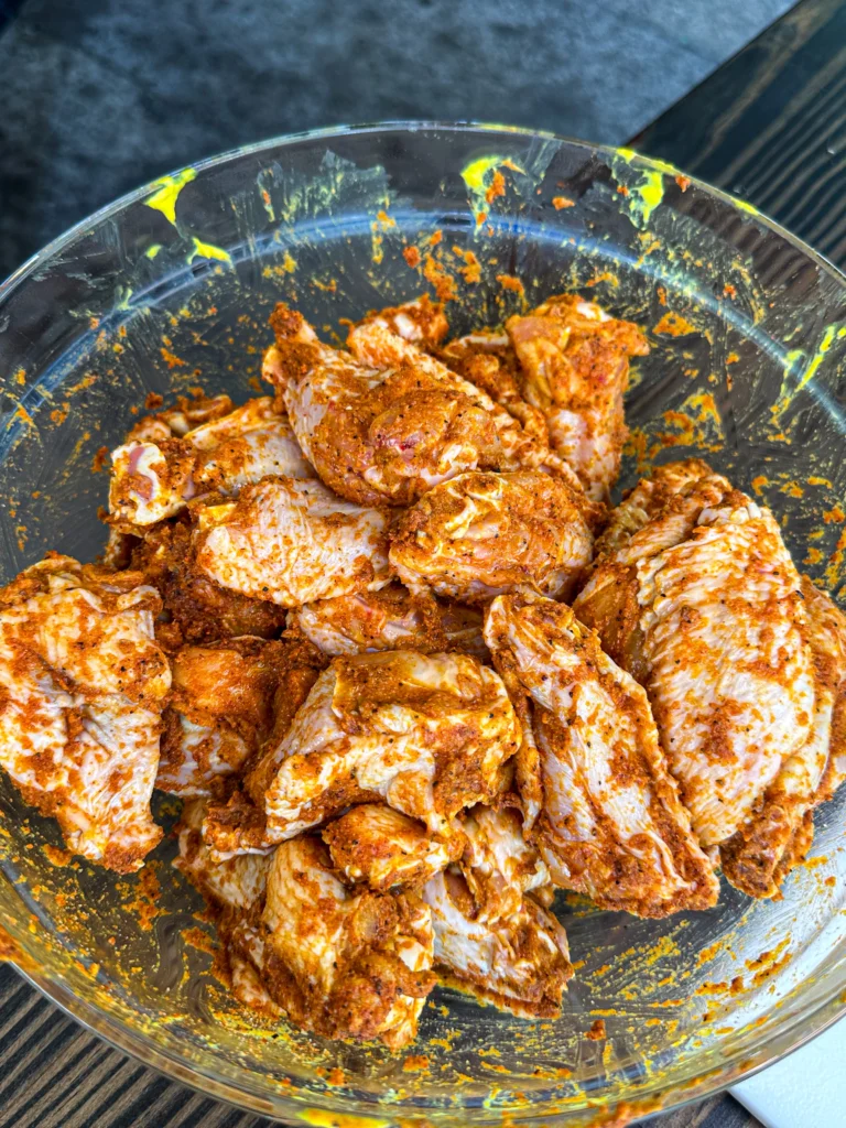 seasoned wings in a bowl