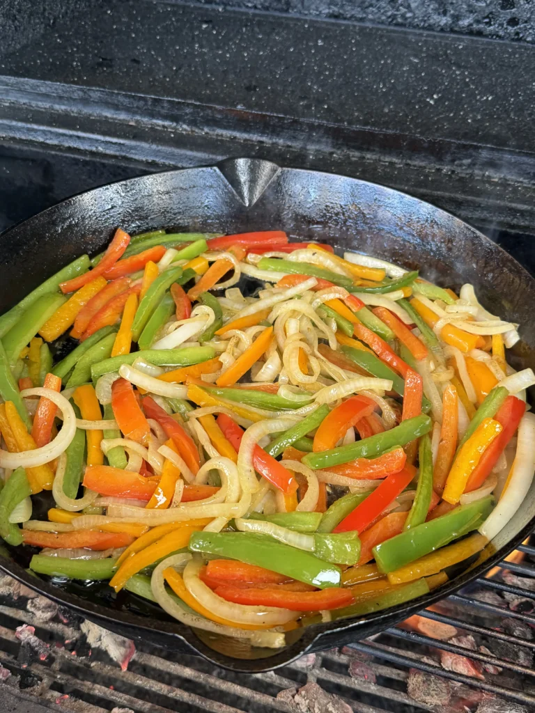 cooking the veggies for the fajitas