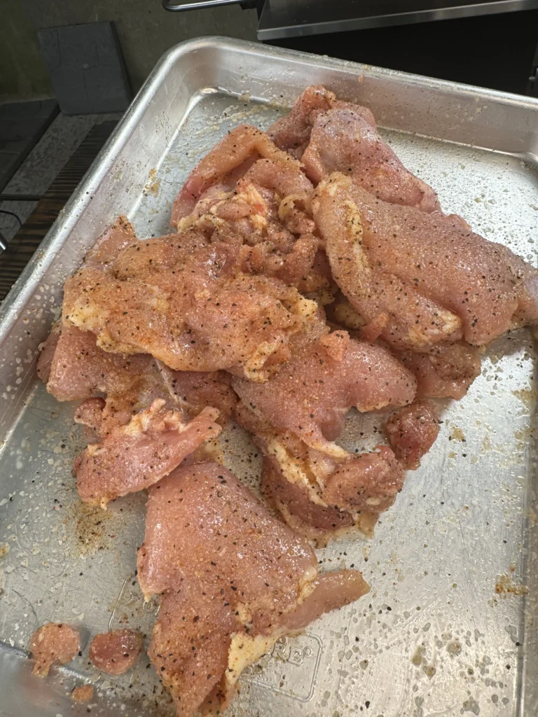 chicken thighs that are seasoned