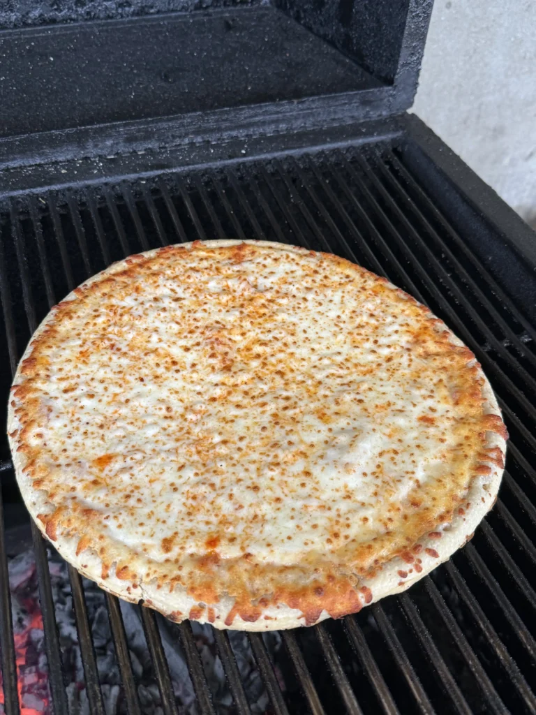 frozen pizza on the grill