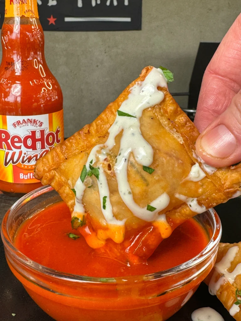 fried wontons in buffalo sauce