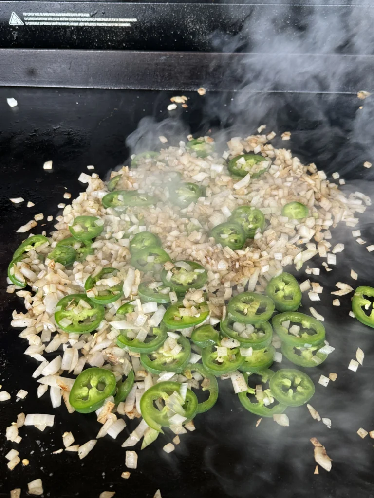 cooking the vegetables on the griddle