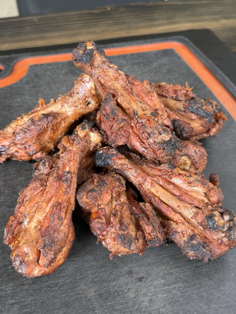 smoked chicken wings on a cutting board