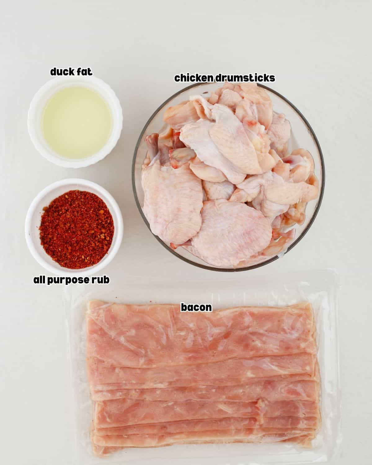 Chicken drumsticks, regular-cut bacon, duck fat, and all-purpose BBQ seasoning arranged for honey jalapeño chicken lollipops.