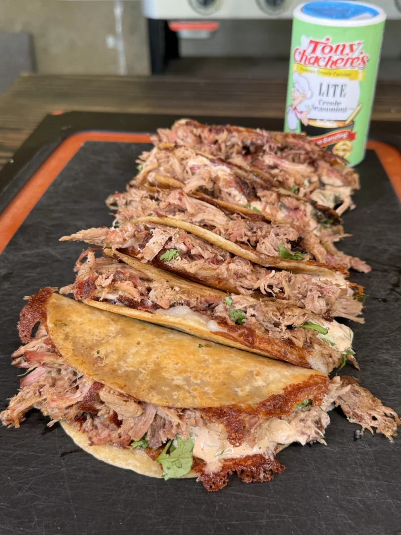 pulled pork tacos on a cutting board