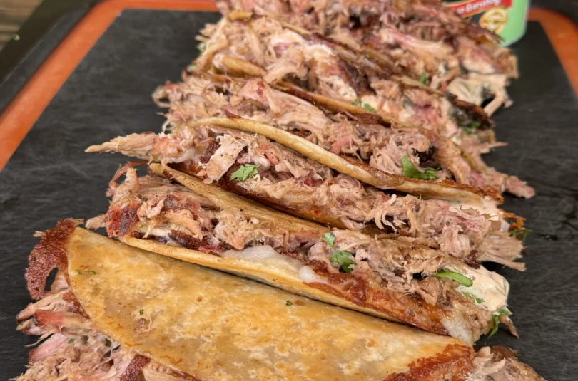 pulled pork tacos on a cutting board