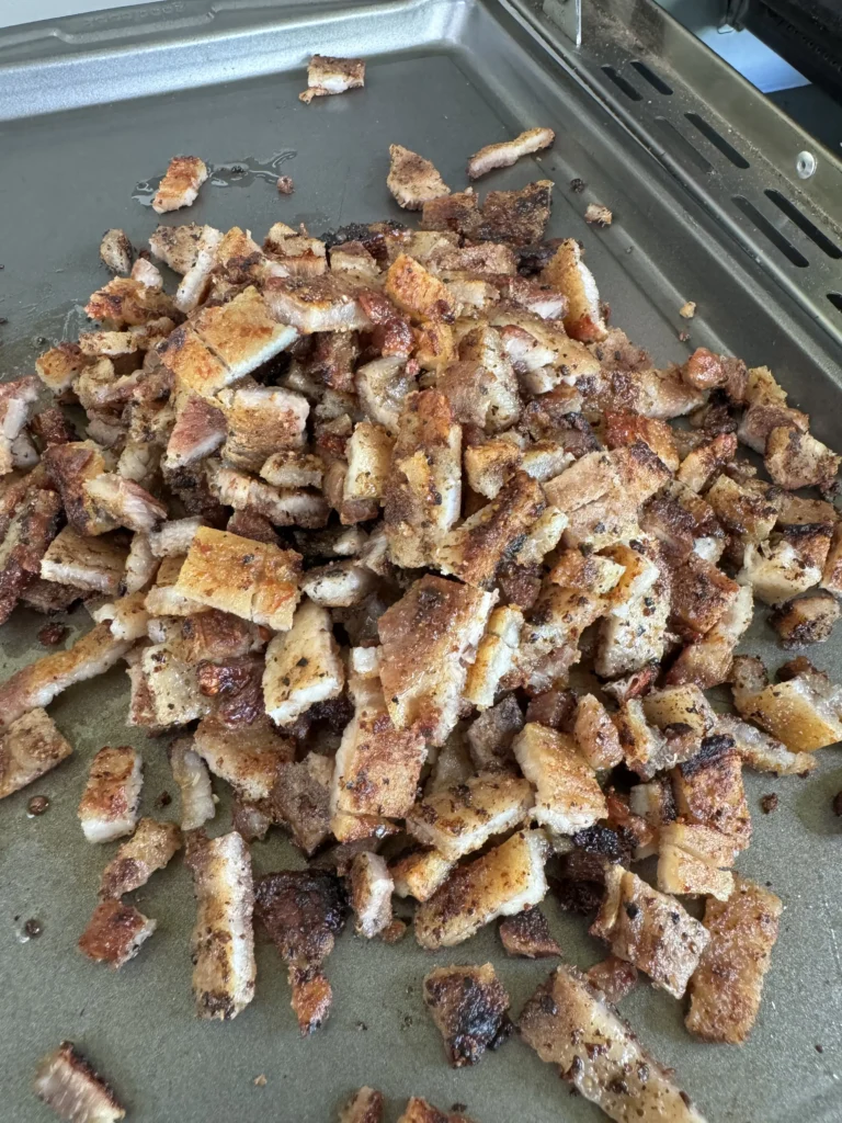 cooked pork belly on a pan