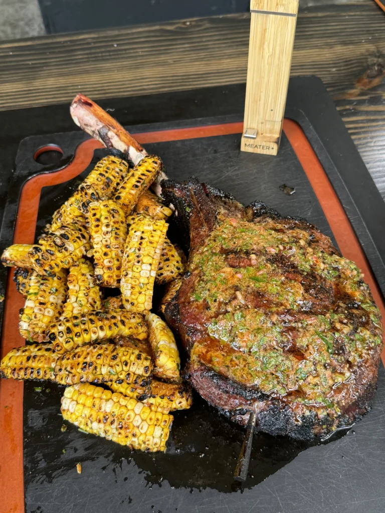 finished dish of corn ribs and steak
