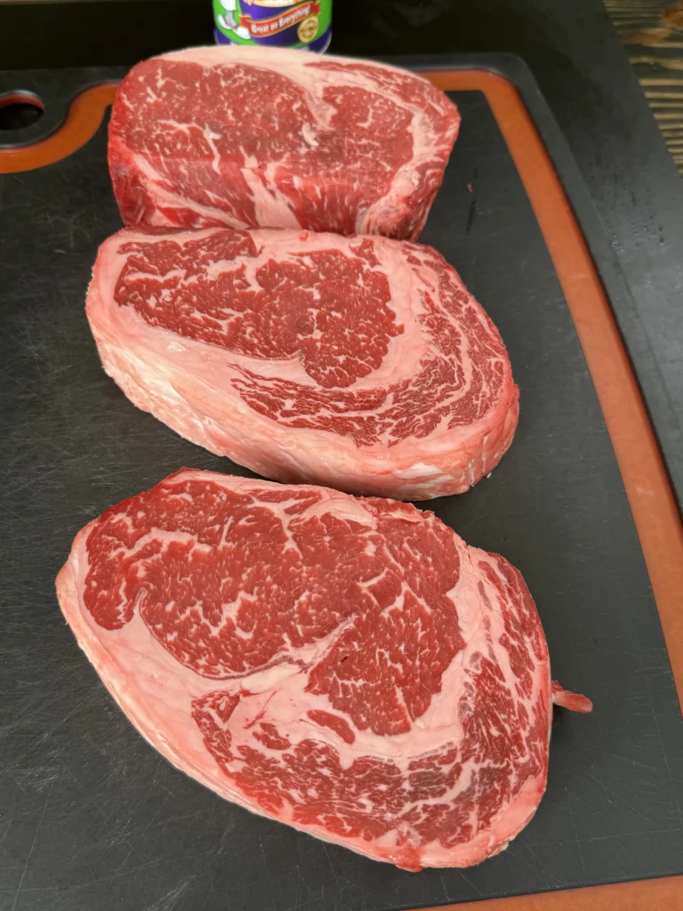 ribeyes on the cutting board