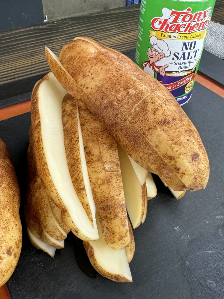 cutting up potatoes for fries